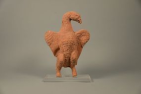 A ROMAN TERRACOTTA FIGURE OF AN EAGLE