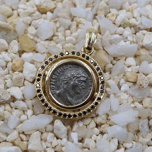 A ROMAN ARGENTEUS OF CONSTANTIUS I SET IN 18K PENDANT WITH DIAMONDS