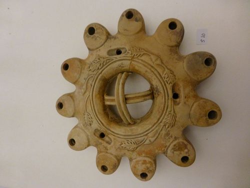 A MULTI-NOZZLE OIL LAMP FROM THE HOLY LAND